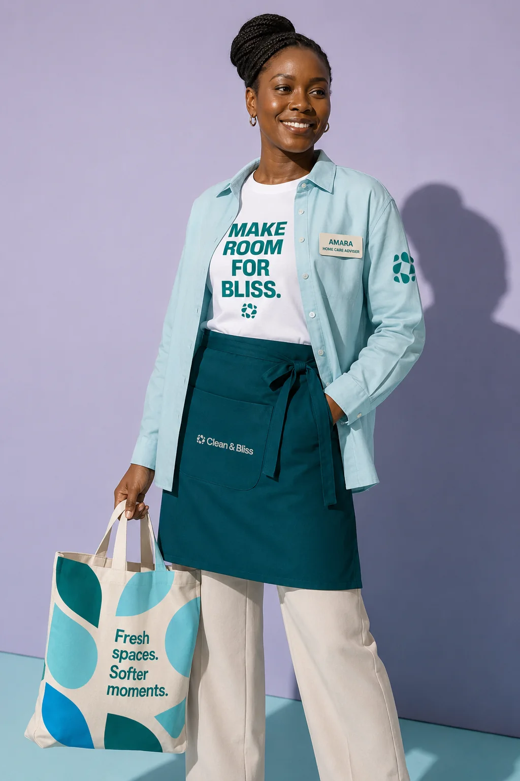 Clean and Bliss uniform and tote bag worn by a team member